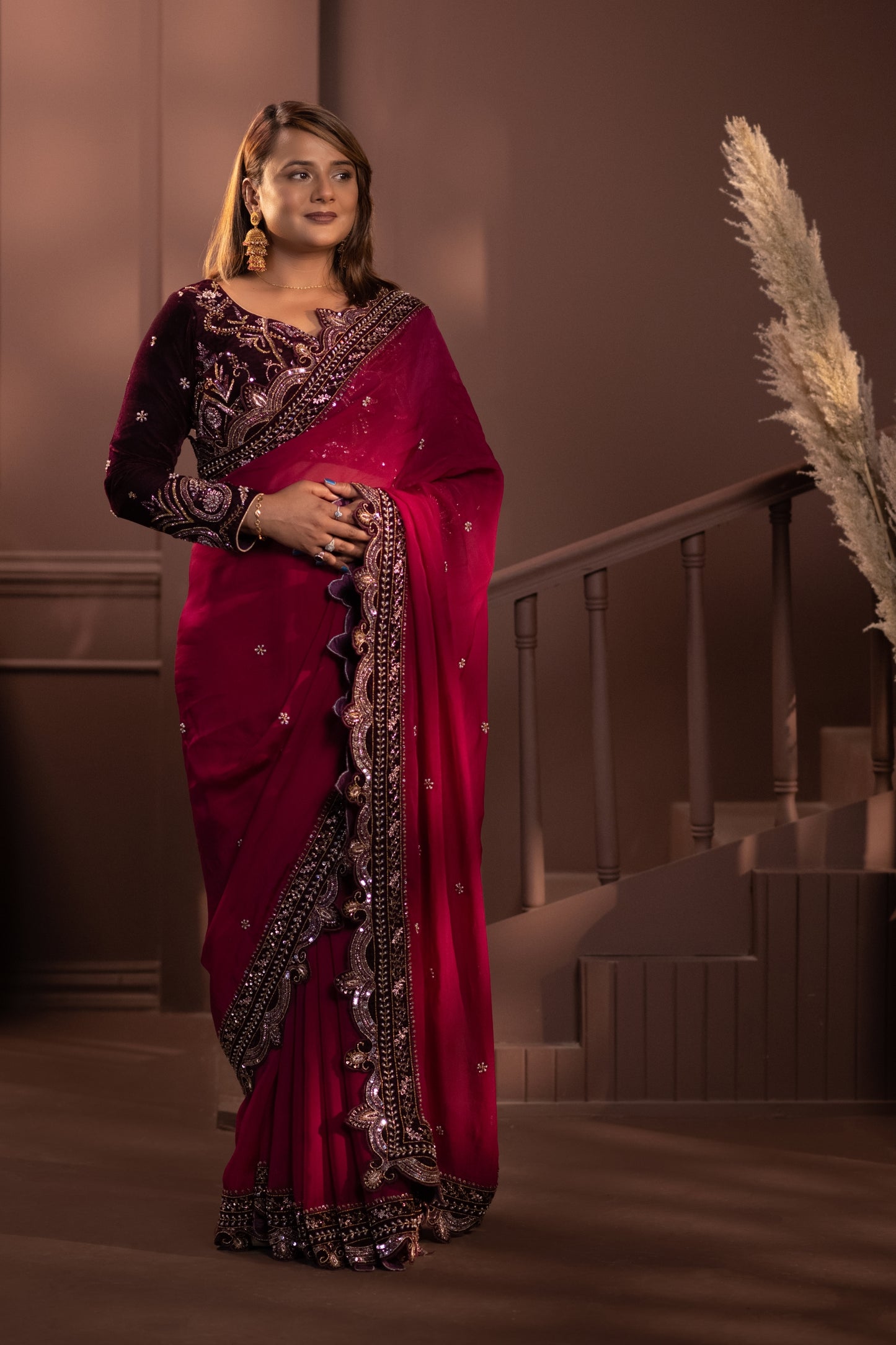 Luxurious Wine Saree with Intricate Embroidery