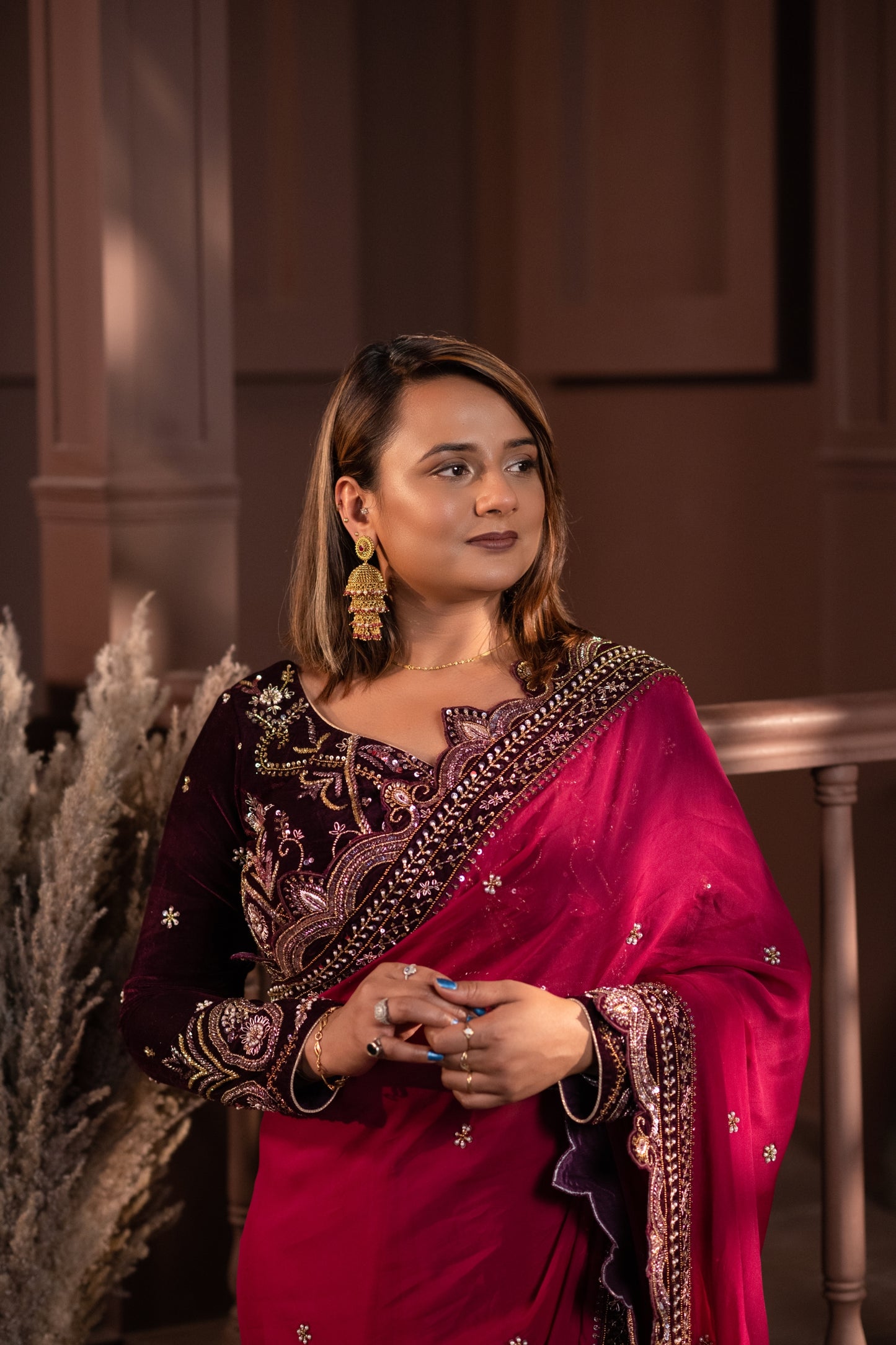 Luxurious Wine Saree with Intricate Embroidery