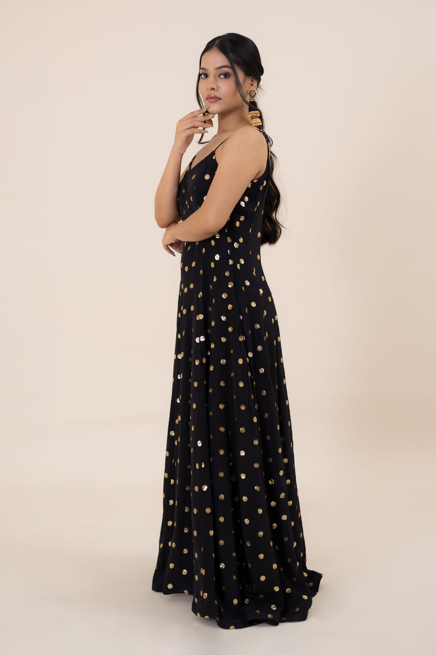 When it comes to fusion style with comfort and tradition, nothing can beat the serenity and beauty of this black one piece dress. This Midnight Black Crepe Embroidered set is an alluring outfit that will surely make you stand out in the wedding crowd. With an exquisite play of dreamy embroidery and a dazzling design, this black dress party wear is a perfect pick for cocktail and reception functions.