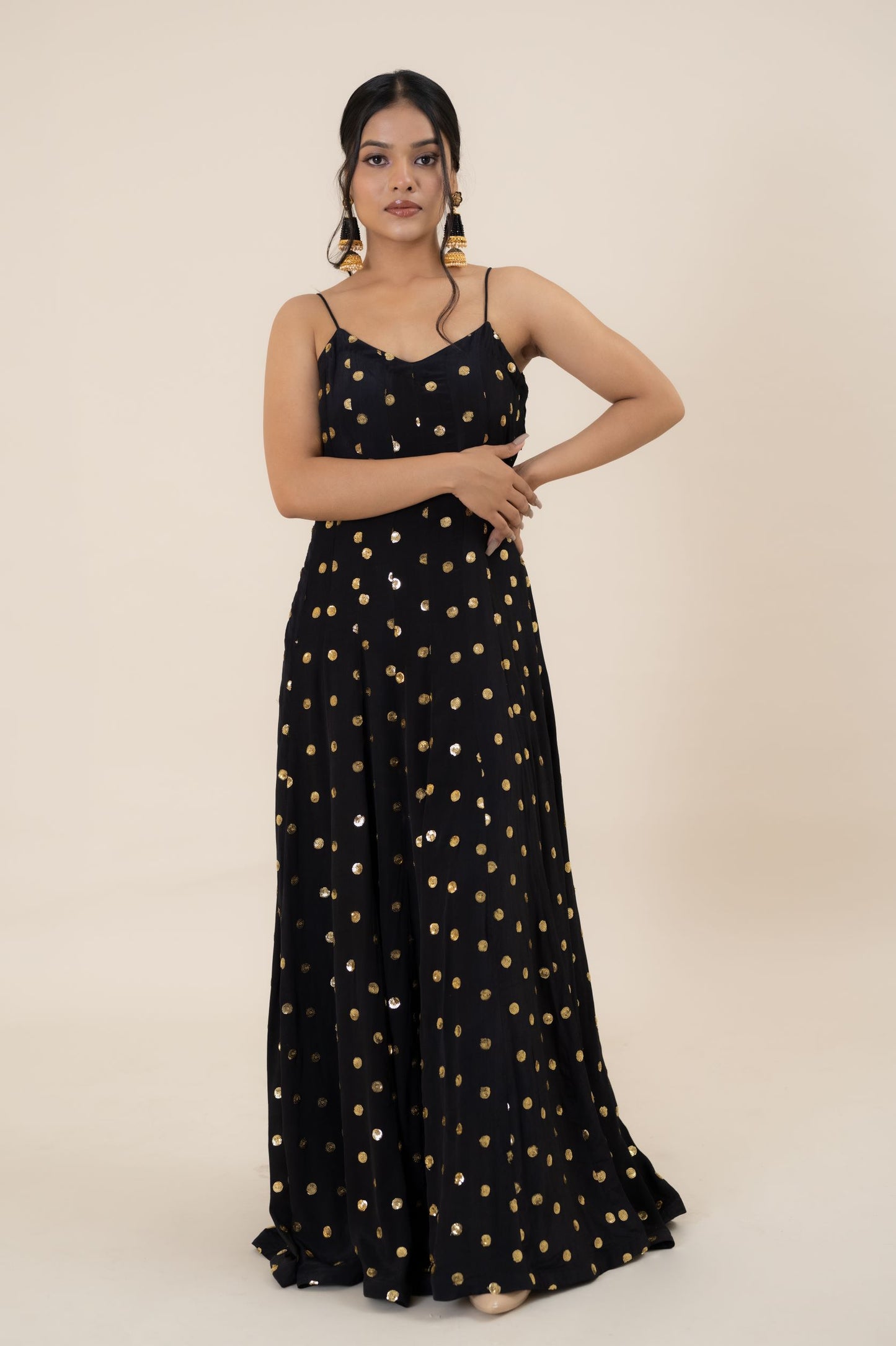 When it comes to fusion style with comfort and tradition, nothing can beat the serenity and beauty of this black one piece dress. This Midnight Black Crepe Embroidered set is an alluring outfit that will surely make you stand out in the wedding crowd. With an exquisite play of dreamy embroidery and a dazzling design, this black dress party wear is a perfect pick for cocktail and reception functions.