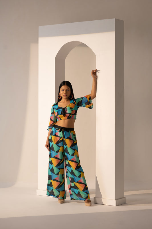 Get ready to turn heads in our stunning Color burst Co-ord Set, perfect for the fashion-forward woman who loves to make a statement. Featuring a vibrant mix of colors in a bold and playful design, this co-ord set is perfect for any occasion. This multi-colored co-ord set is perfect for women's fashion, and the bright colors and fun design make it a standout piece in any wardrobe.