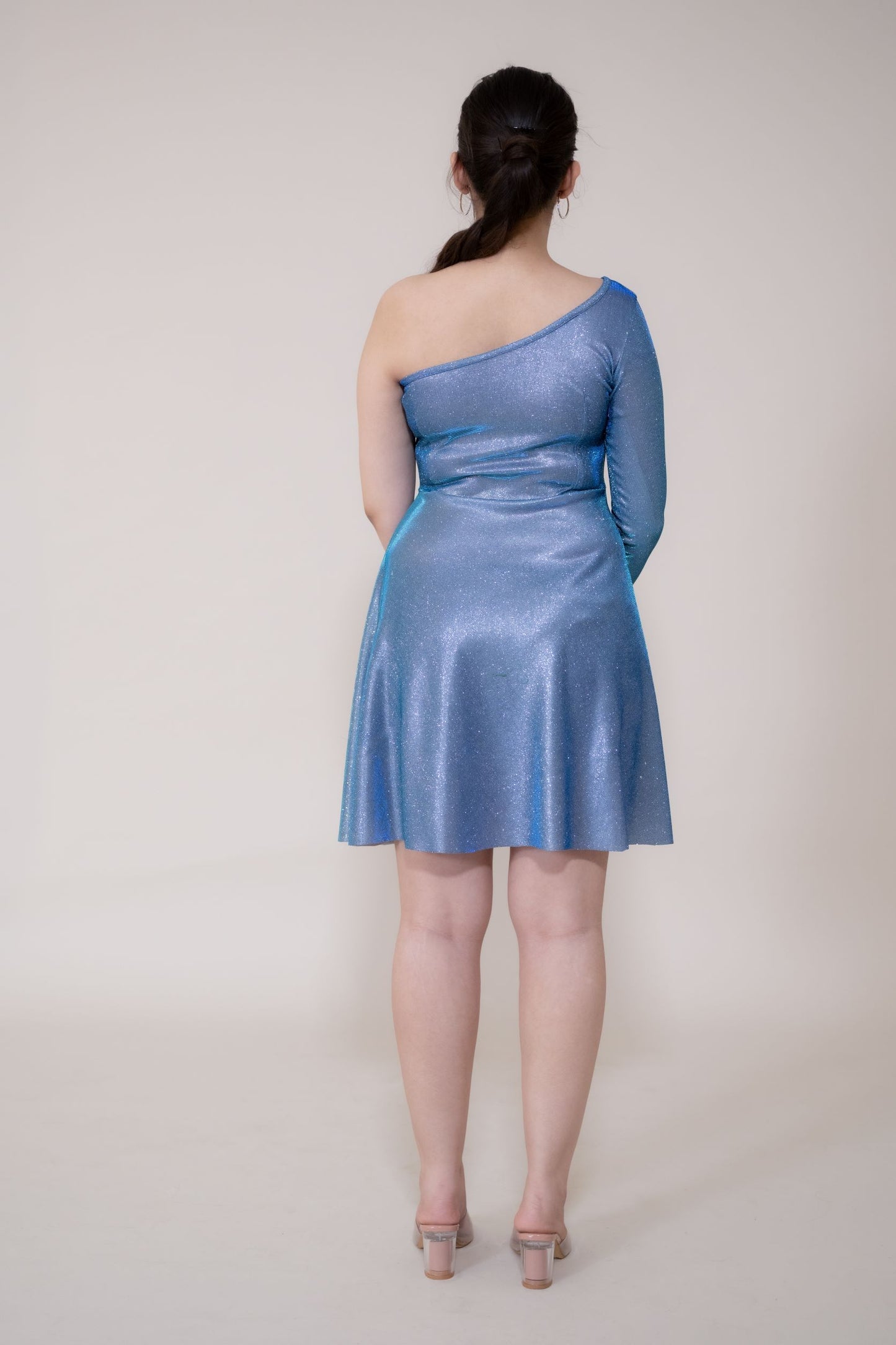 This Blue Sparkly dress is an off shoulder one piece short dress which shines bright like a diamond and stands out against the crowd. The Electric blue dress is a perfect short dress for party which is super comfortable and makes you look classy and foxy.
