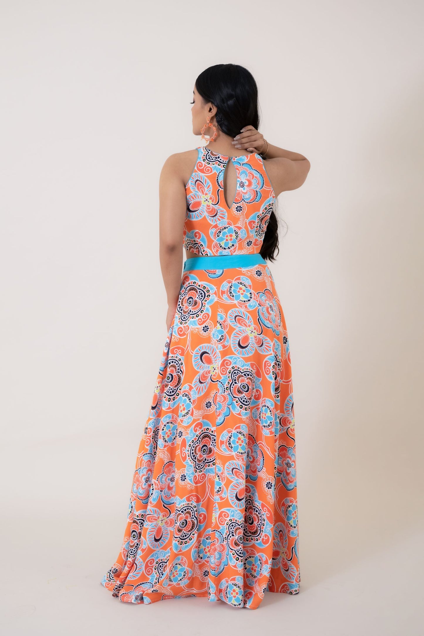 This Bohemian beach dress is one of the few women beach outfits which was designed to be your go-to summer dress. It can keep you cozy and comfortable all day long. The high slit skirt will make your legs look teasingly attractive and is one of the perfect beach dresses for honeymoon. Its an exquisite casual beach outfit which will fit you perfectly and make you feel relaxed and breezy. Fabric - Muslin